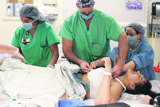 Opera?ii gratuite de reconstruc?ie a sânului