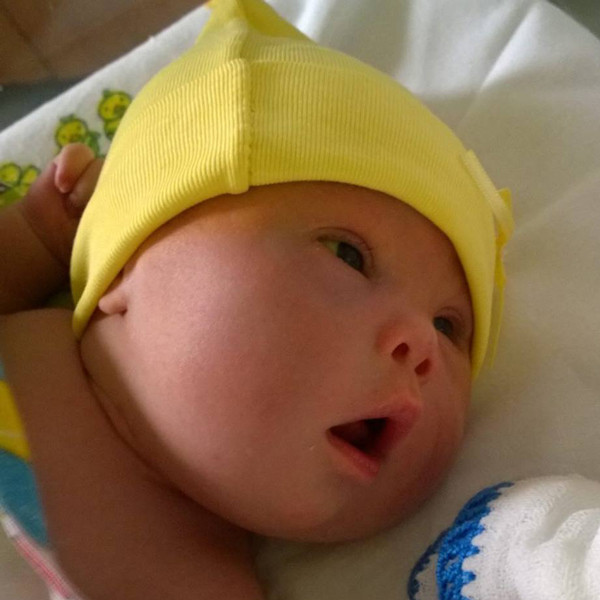 Tatal alege copilul cu Sindromul Down in locul sotiei care a vrut sa isi abandoneze nou-nascutul