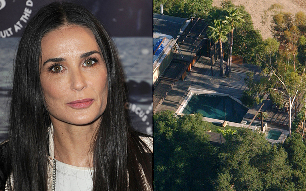 Tanar mort gasit in piscina lui Demi Moore!