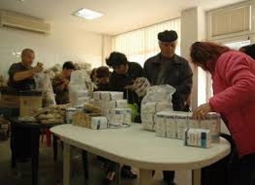 Se distribuie pachetele cu alimente!