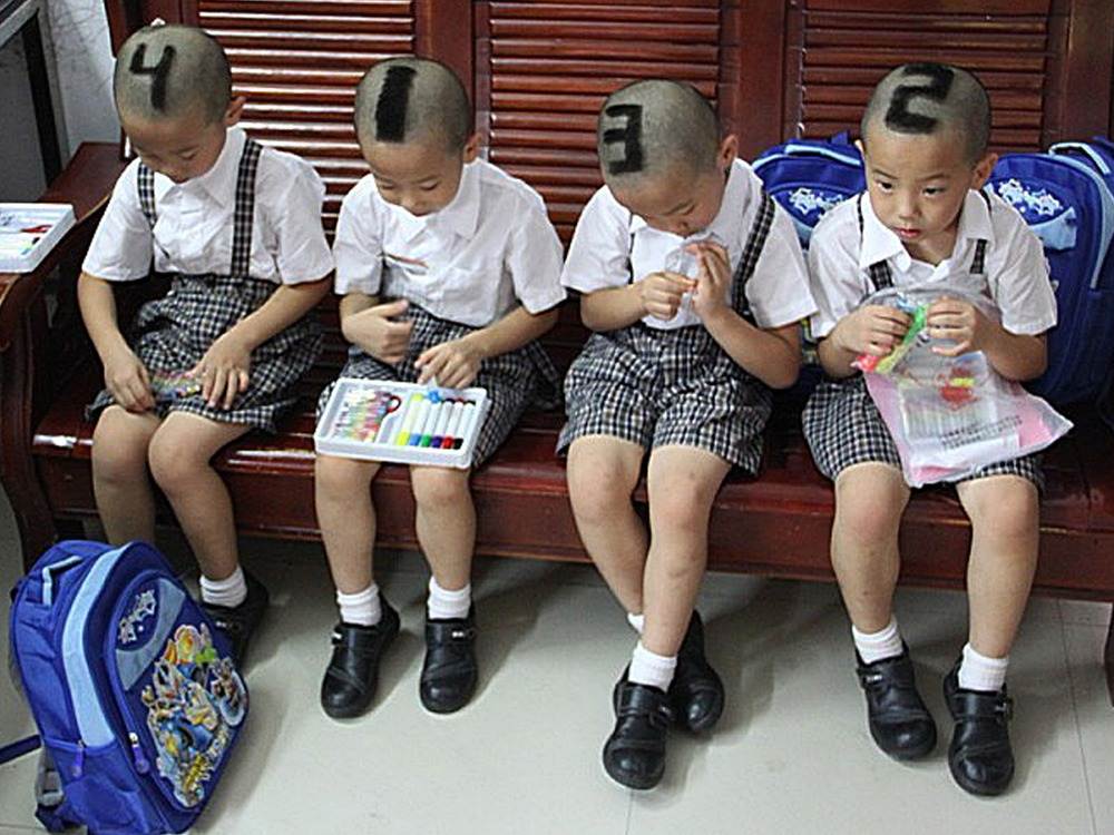 Picture of the Day: How to recognize your kids when you have quadruplets