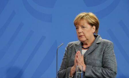 Merkel: conflict intre tarile balcanice tranzitate de refugiati