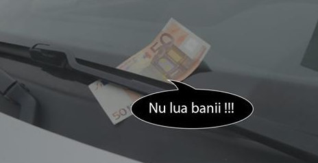 Dacă găsești bani pe parbrizul mașinii, NU-I LUA!