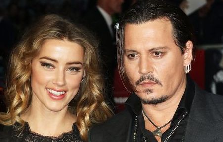 Johnny Depp şi Amber Heard divorţează