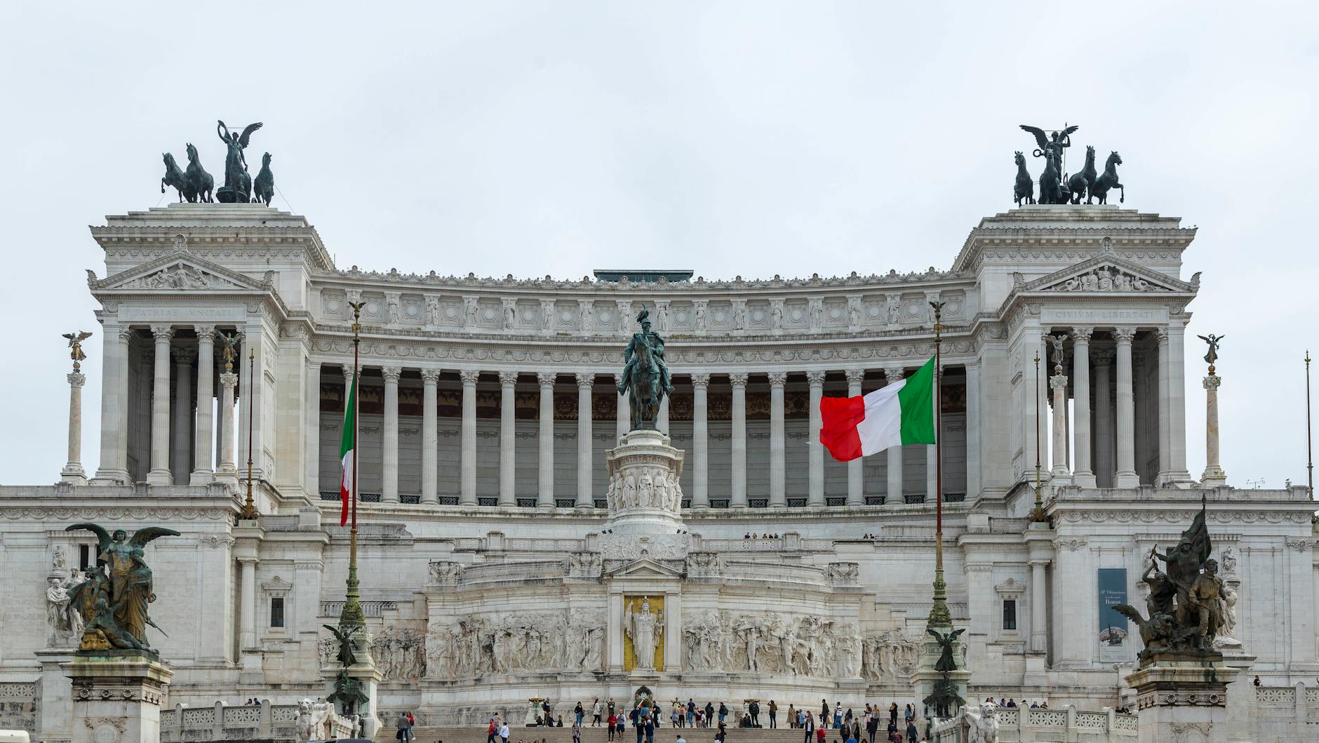 people walking in front of piazza venezia